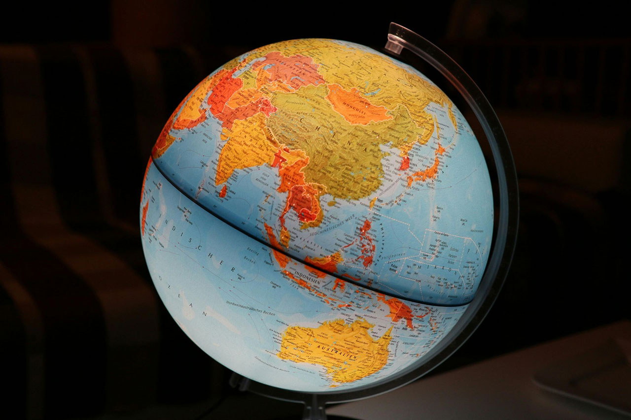 World map on a globe.